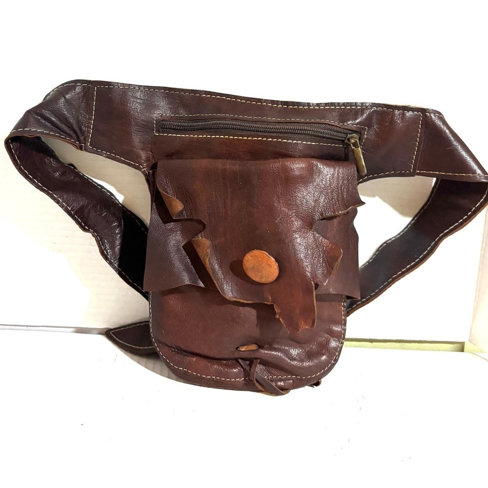 Brown distressed unisex shoulder/wrist Leather bag